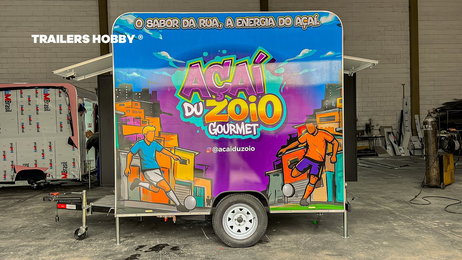 Detalhe da arte em grafite do trailer Açaí du Zoio